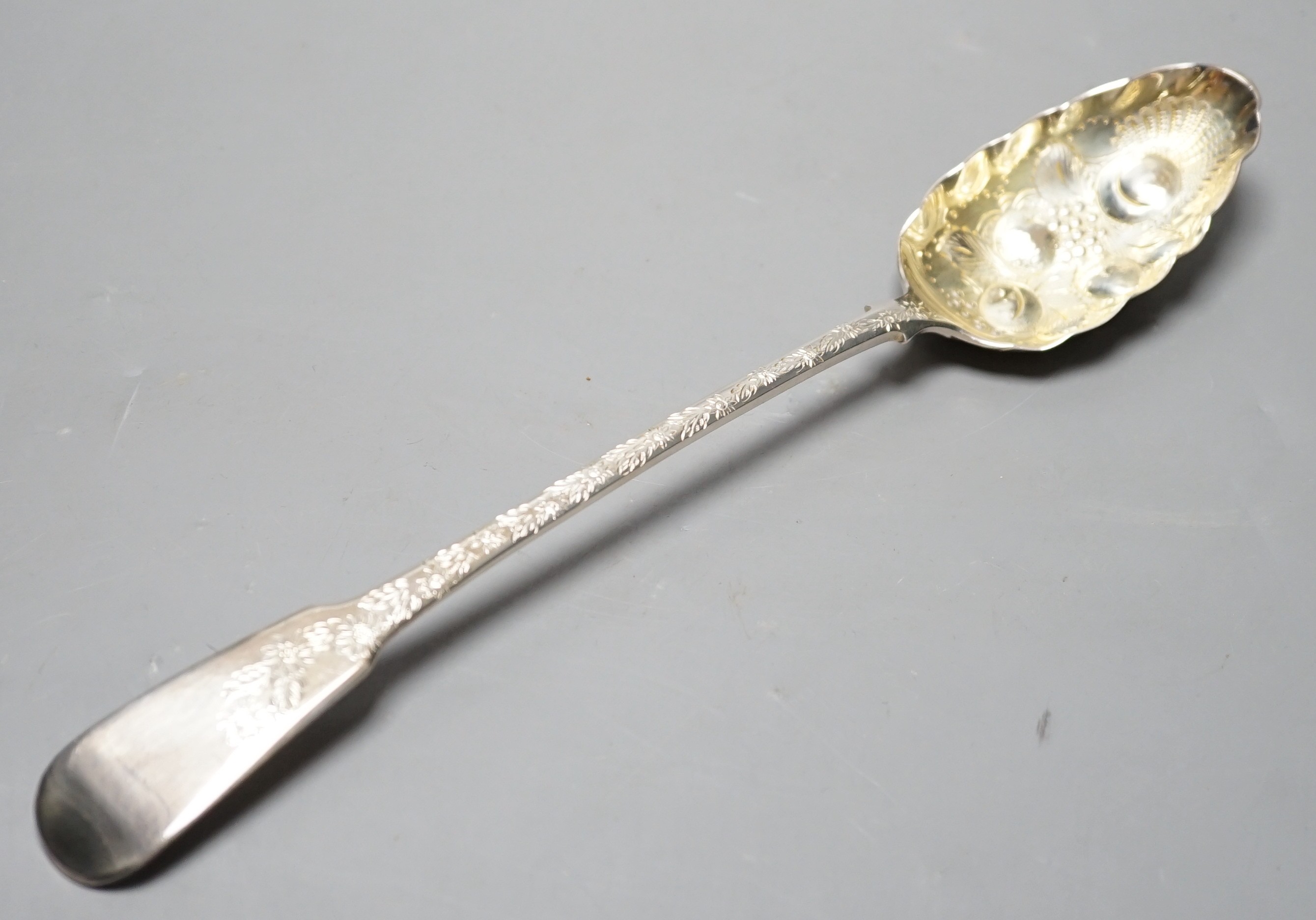 A late George III silver fiddle pattern embossed 'berry' basting spoon, Eley & Fearn, London, 1817, 30.6cm, 113 grams.
